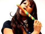 Beautiful brunette non-professional British teen with pierced tongue Natalia sucking a lollipop with lust